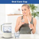 Beautiful woman using the Smart Ozone Water Cup to enhance oral care – a perfect addition to your daily routine for fresher breath and healthier gums.
